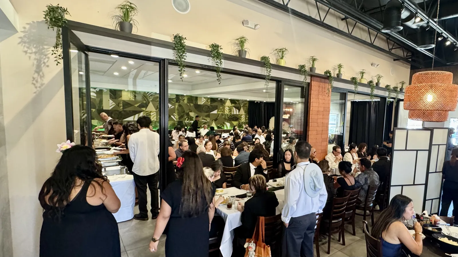 The Max's San Diego dining room with a buffet line set for a large group
